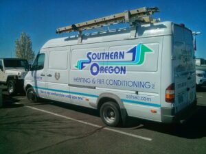 A branded HVAC service van from Southern Oregon Heating & Air Conditioning in Medford, OR
