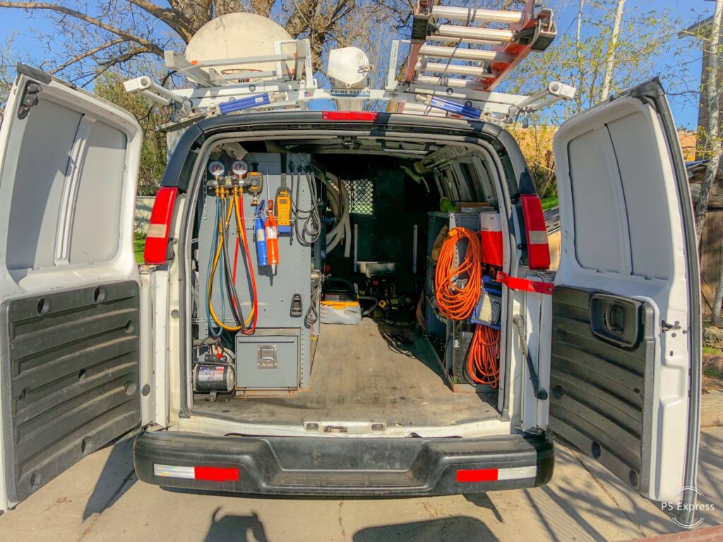 The organized tools and equipment inside an HVAC service van for Peterson Heating & Cooling in Mound City, KS.