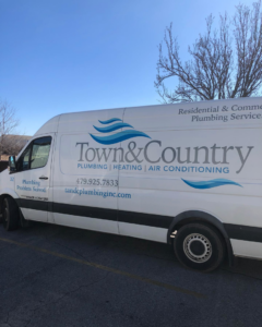 A Town & Country Plumbing service van for HVAC, heating, and air conditioning in Albuquerque, NM.