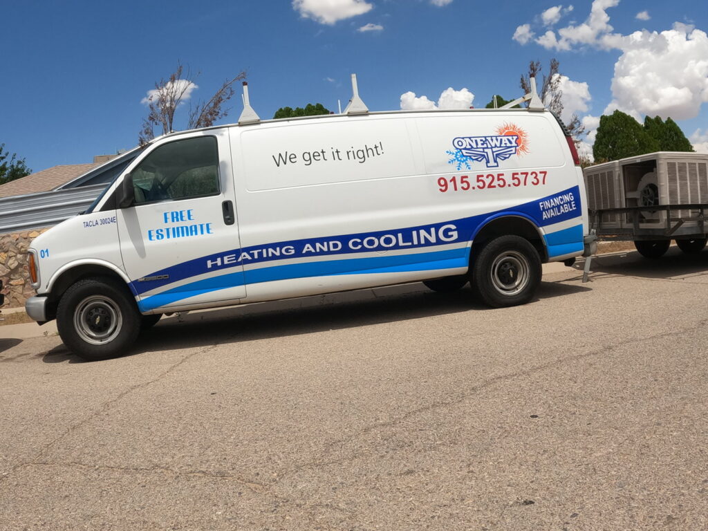 A One Way Heating And Cooling, LLC service van transporting a new HVAC unit on a trailer in Horizon City, TX.