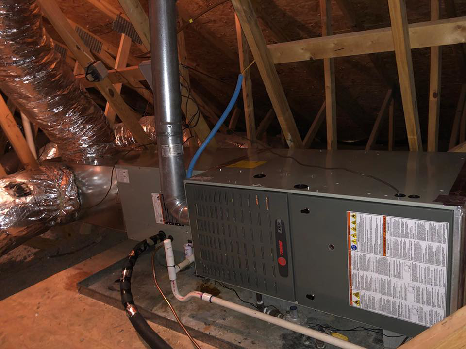 An HVAC system with ductwork installed in an attic by Fred's Heating And Cooling in Charlotte, NC