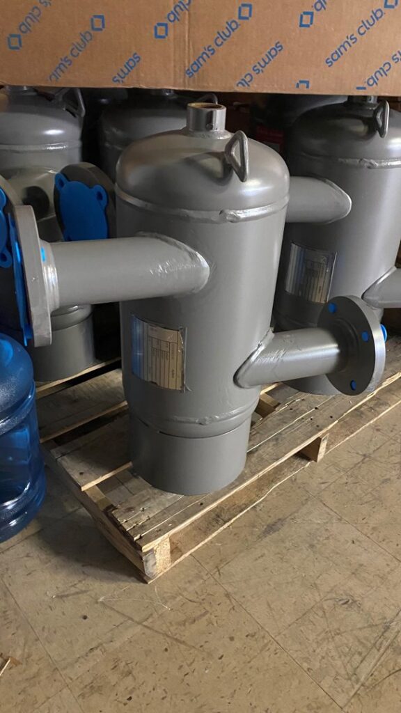 A grey cylindrical HVAC system component tank on a wooden pallet at Thermoflo Equipment in Pittsburgh, PA