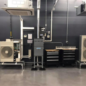 An array of HVAC system components, including indoor units, ductwork, and a furnace, by Comfort Coach in Glade Hill, VA