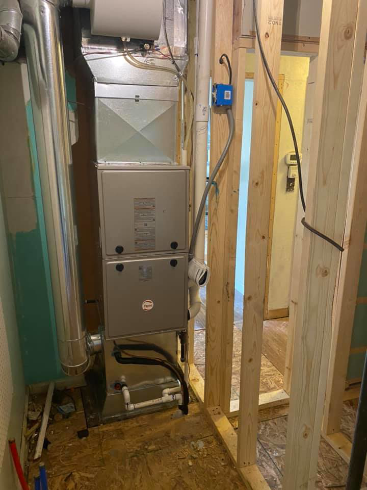 An HVAC system installation with furnace and ductwork during construction by R. Jones Heating & Cooling in Indianapolis, IN.