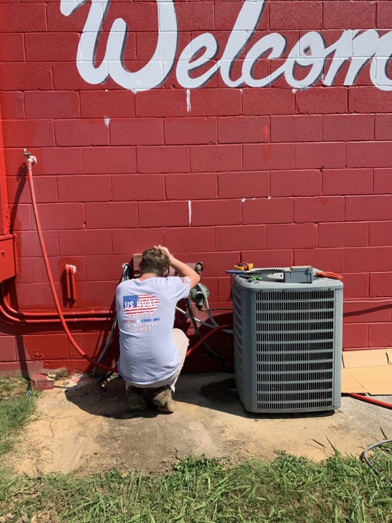 An HVAC system undergoing maintenance and repair by a skilled technician from U.S. HVAC Services, LLC in Madison, AL.