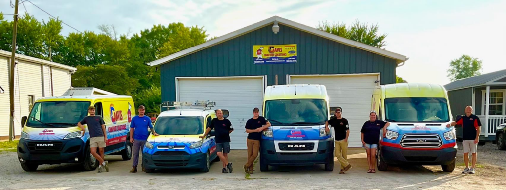 The HVAC team and their service vans ready for jobs at Davis Comfort Solutions-Heating & Cooling in Fowler, IN