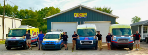 The HVAC team and their service vans ready for jobs at Davis Comfort Solutions-Heating & Cooling in Fowler, IN
