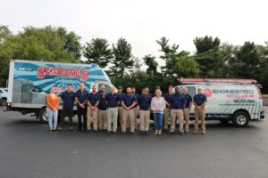 Combined HVAC teams from Semones and Engineered Heating and Air with their service vehicles for Leap Partners in Greensboro, NC.