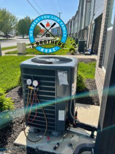 An HVAC technician checking refrigerant levels on an outdoor AC unit with gauges, performed by 2 Brothers HVAC in Seguin, TX