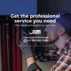 An HVAC technician inspecting heating and cooling pipes during a service call for S&J Heating and Cooling NJ in Elizabeth, NJ.