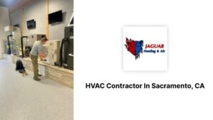 An HVAC technician inspecting an indoor unit at Jaguar Heating & Air in Sacramento, CA