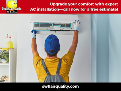 An HVAC technician installing an indoor AC unit for Southwest Florida Air Quality in Cape Coral, FL