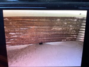 A Fluke multimeter showing a reading during an HVAC service by McCutcheon & Sons Air Conditioning and Plumbing in Tempe, AZ