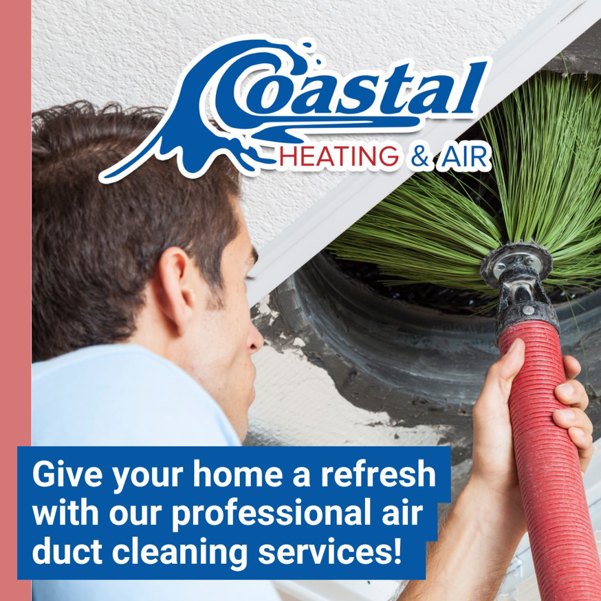 An HVAC technician performing professional air duct cleaning services for a home in Wilmington, NC, by Coastal Heating and Air.