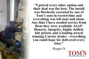 An HVAC technician repairing a furnace at a client's home for Tom's Heating Service in Waukesha, WI.