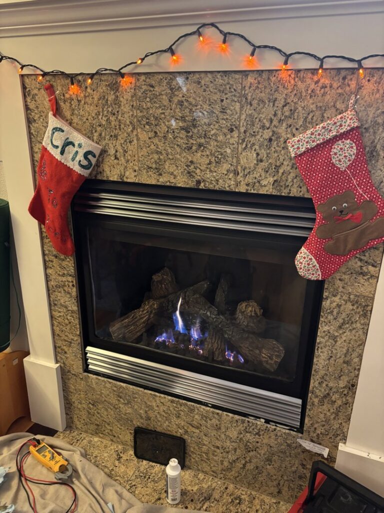 An HVAC technician's tools laid out on a drop cloth while servicing a gas fireplace for Sound Comfort Heating & Air Conditioning in Everett, WA.