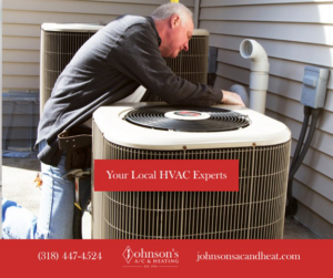 An HVAC technician servicing an outdoor air conditioning unit for Johnson's A/C & Heating in Alexandria, LA.