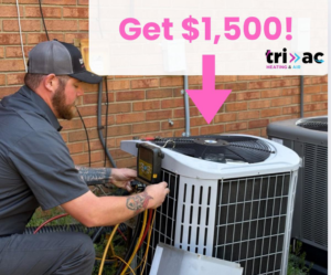 An HVAC technician performing maintenance and service on an outdoor condenser unit for a client by TRI AC in Canton, GA.