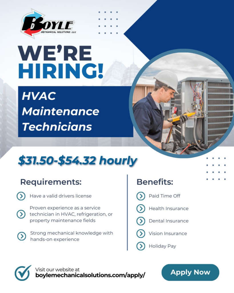 An HVAC technician servicing an outdoor air conditioning unit for Boyle Mechanical Solutions in Dayton, OH.