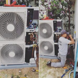 An HVAC technician servicing an outdoor air conditioning unit for Reading Plumbing, Heating & Air Conditioning in Roswell, NM