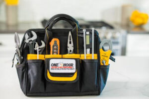 A professional HVAC technician's toolbox filled with essential tools from One Hour Heating & Air Conditioning of West Valley in Phoenix, AZ