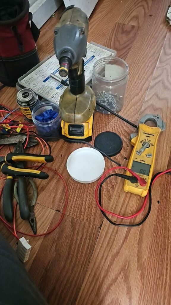 Various HVAC technician tools, including a multimeter and power drill, used by Anubis Mechanical in Goose Creek, SC.