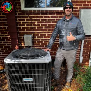 An SBS-NC, LLC technician standing proudly next to a newly serviced residential HVAC unit in High Point, NC.