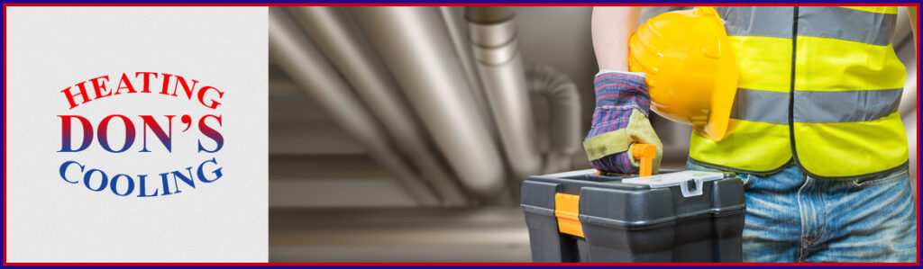 An HVAC technician holding a hard hat and toolbox, ready for service at Dons Heating and Cooling in Mobile, AL.
