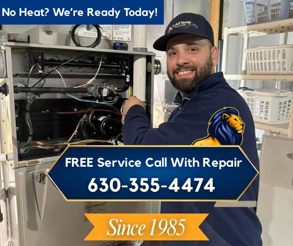 An HVAC technician from A All Temp Inc. Heating & Cooling working on a furnace in Naperville, IL.