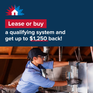 An HVAC technician working on an air handler unit in an attic for Service Experts Denver in Westminster, CO