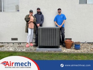 Airmech Heating and Air Conditioning technicians with a customer after a new AC unit installation in Elk Grove, CA.