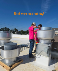 HVAC technicians installing commercial rooftop ventilation units for Pepeta Service Inc. in Clayton, DE