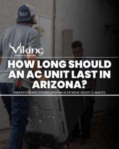 HVAC technicians moving an AC unit for installation or replacement at Viking Heating and Air Conditioning, LLC in Chandler, AZ