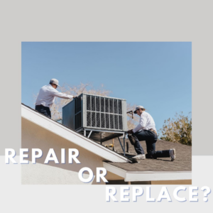 Two Instant Air HVAC technicians repairing an outdoor air conditioning unit on a roof in Las Vegas, NV.