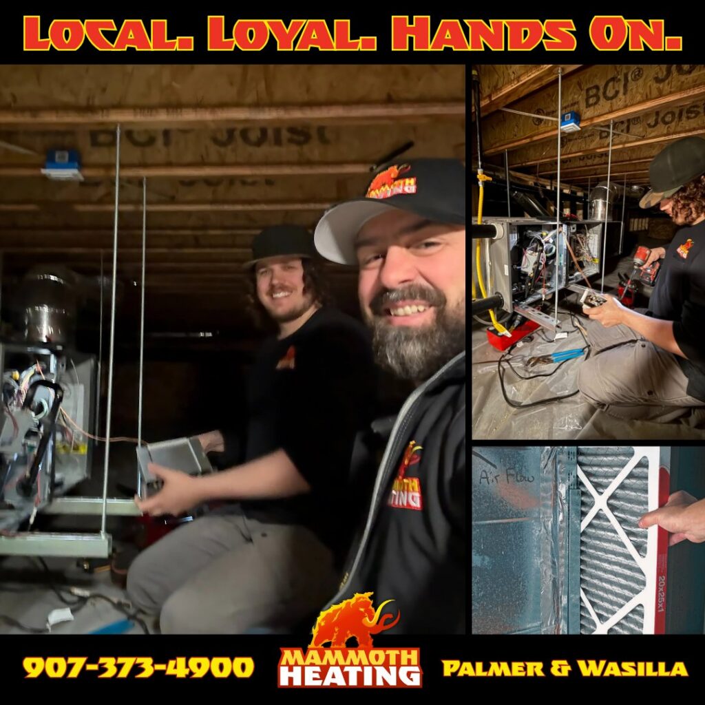 Mammoth Heating technicians working on a furnace and checking an air filter during an HVAC service in Wasilla, AK.