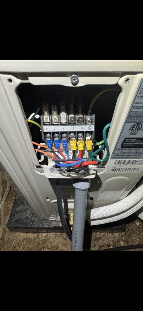 Internal electrical wiring connections of an HVAC unit, demonstrating work by Delta Current Electric in Jonesboro, AR.