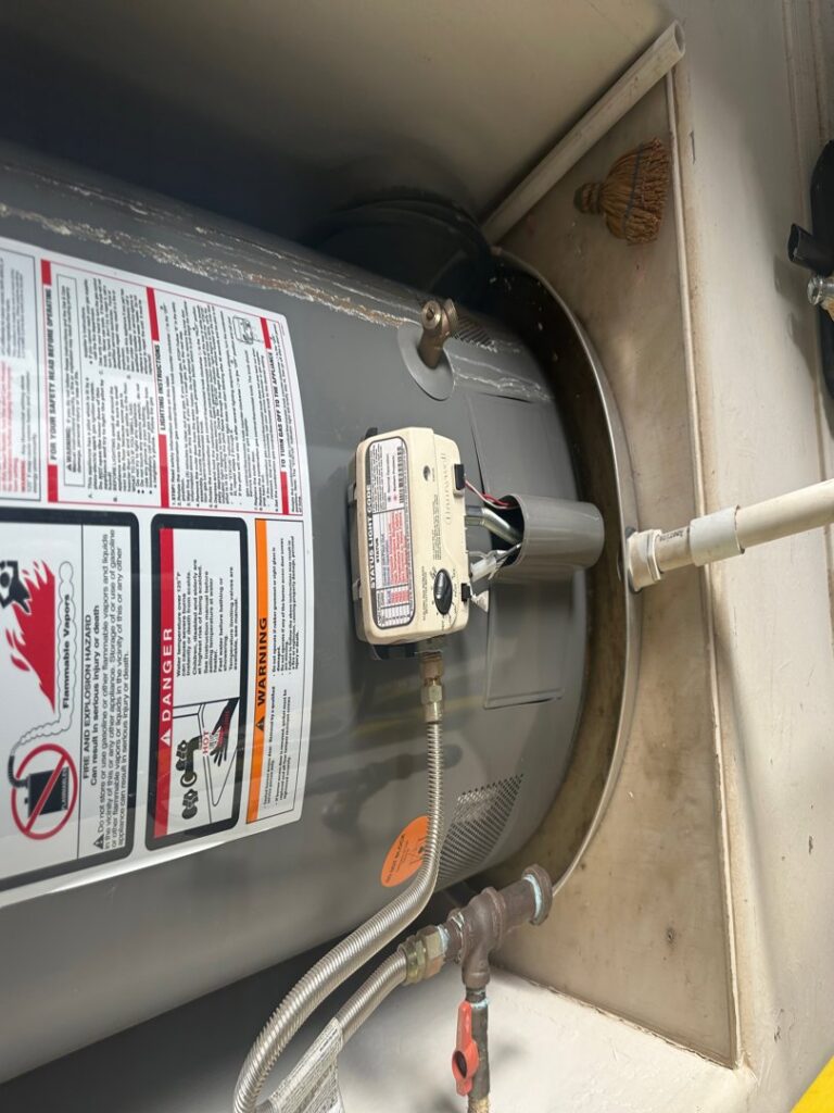 Close-up of electrical wiring and warning labels on an HVAC unit by McCutcheon & Sons Air Conditioning and Plumbing in Tempe, AZ