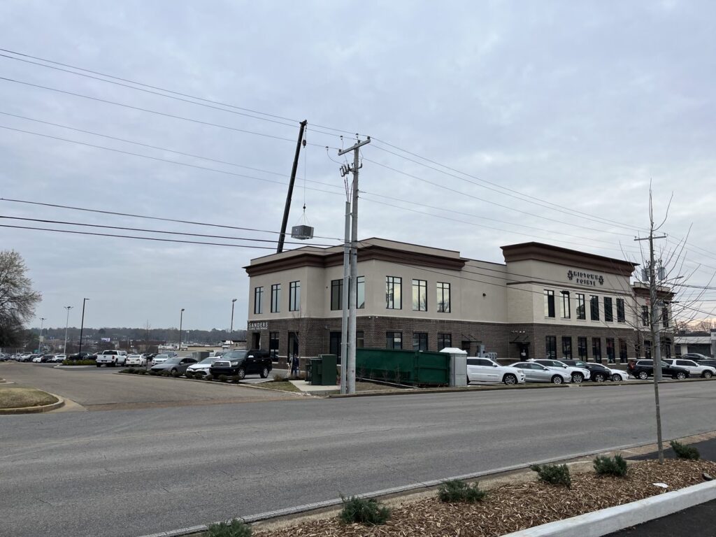 A new HVAC unit being installed on a commercial building rooftop by Comfort Engineering Co Inc in Tupelo, MS