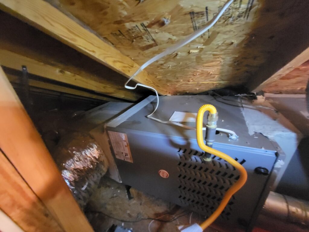 An HVAC unit and ductwork installed in an attic space by Blue Sky Heating and Air in Austin, TX.