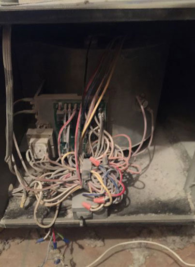 Internal wiring of an HVAC unit requiring repair or maintenance by Viking Heating and Air Conditioning, LLC in Chandler, AZ