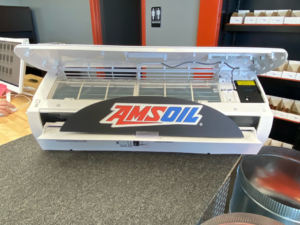 An indoor HVAC unit with its cover open, showing internal components for service or inspection at Cooler City in Victorville, CA