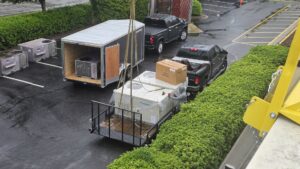 New HVAC units being unloaded from a trailer, ready for installation by Peak Seasons HVAC in Raleigh, NC.