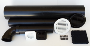 A collection of HVAC ventilation parts including black pipes, white and black grilles, and filters from ABD Creative Solutions in Caldwell, ID.