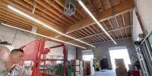 Interior of the Expert Air Conditioning & Heating workshop with visible HVAC ductwork and equipment in Las Vegas, NV.