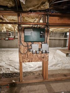A heating system zone control panel with circulator pump controls installed by Perfect Temp LLC in Bozeman, MT.