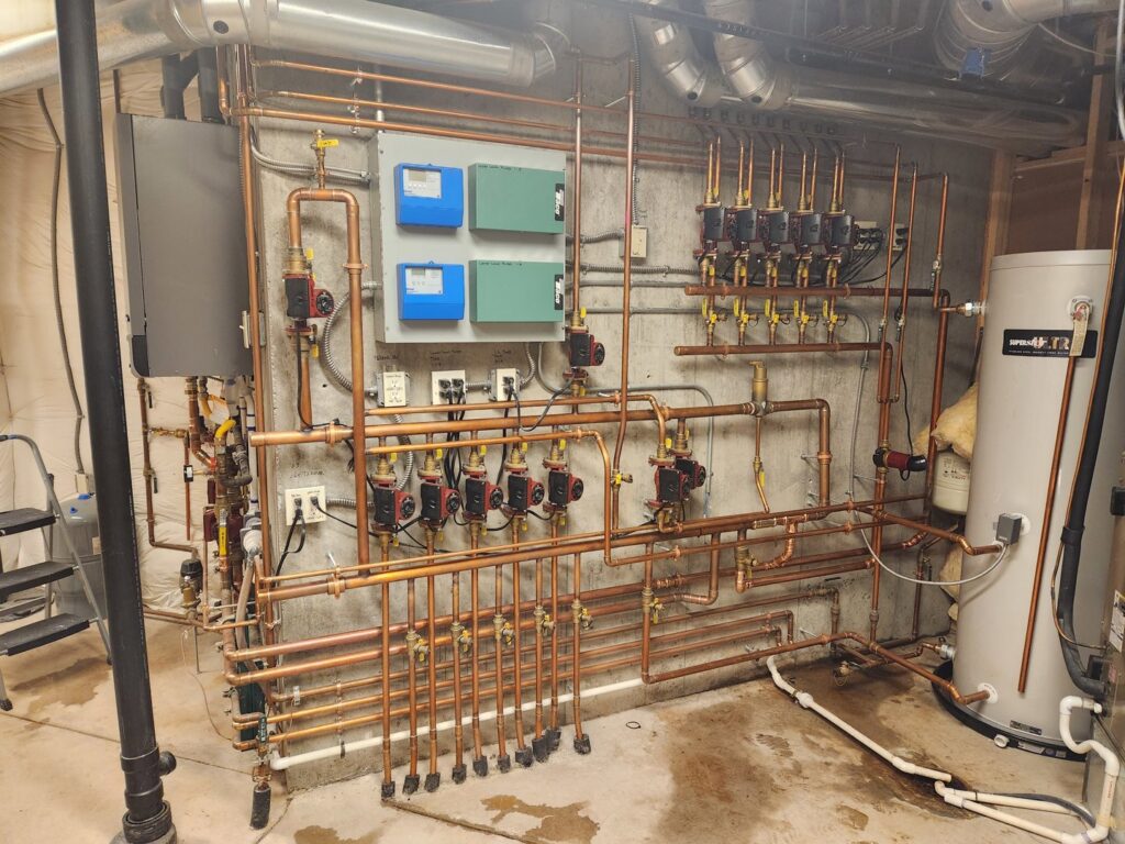 A complex hydronic heating and boiler system installation by Reliable Heating & Cooling LLC in Colorado Springs, CO