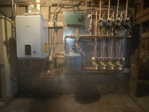 A newly installed hydronic heating system with a tankless water heater by Burley Hvac/r LLC in Syracuse, NY.