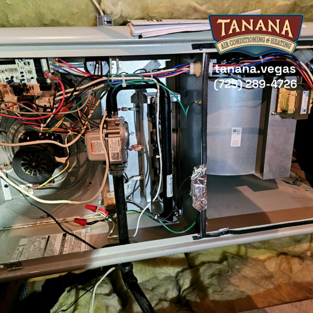 A detailed view of the internal components and wiring of an indoor air handler serviced by Tanana Air Conditioning & Heating in Las Vegas, NV.