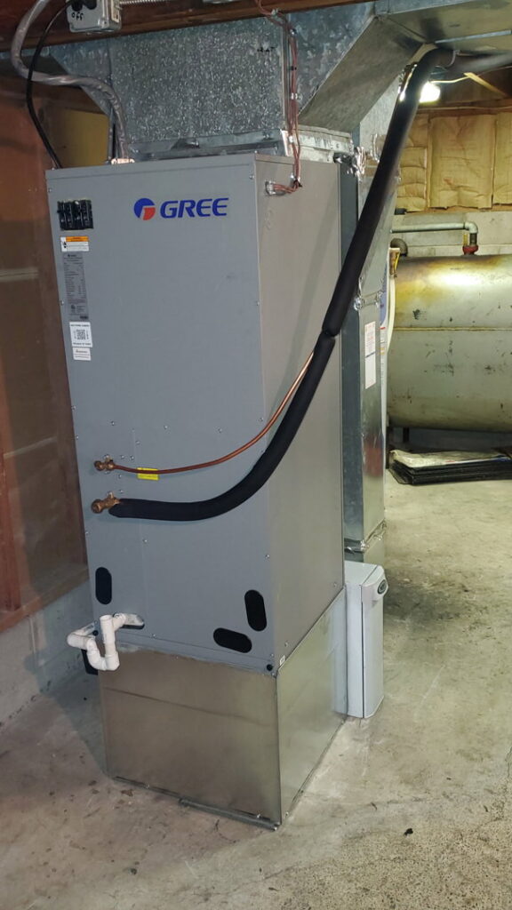 An indoor air handler or furnace unit with ductwork installed by Empire Heating & Air Conditioning in Decatur, GA