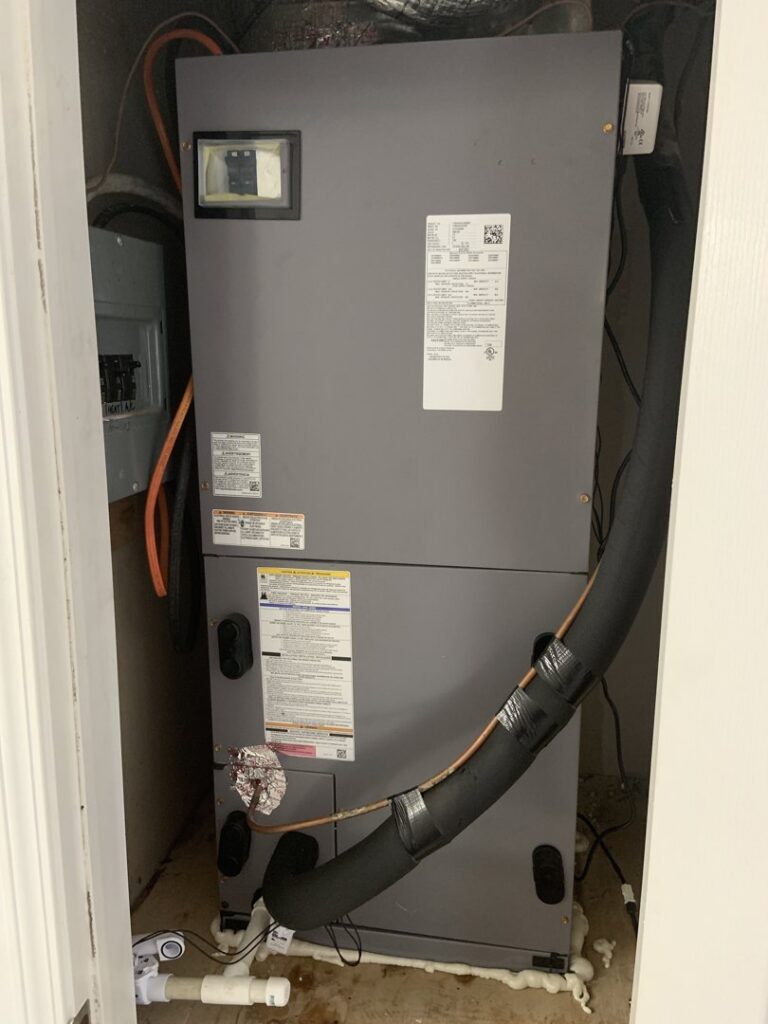 An indoor air handler or furnace unit installed in a utility closet by Calloway & Sons A/C And Heating in New Orleans, LA.